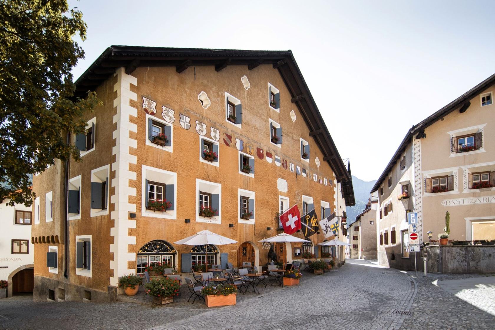 Historic Hotel Crusch Alva on the village square in Zuoz